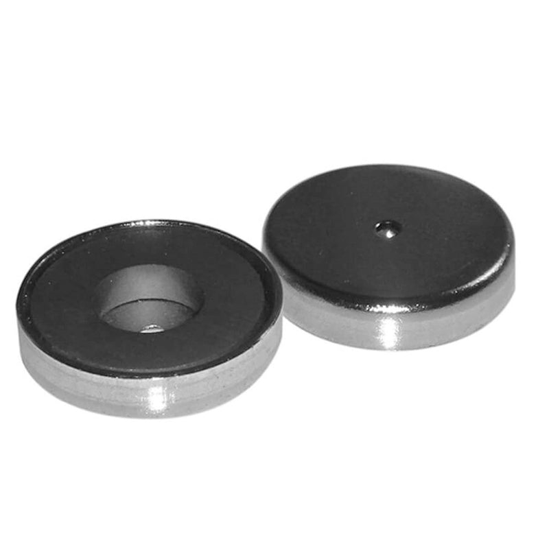 Angled view of Foxfire 25lb cup magnets, pack of 2, showcasing recessed mounting holes on white background
